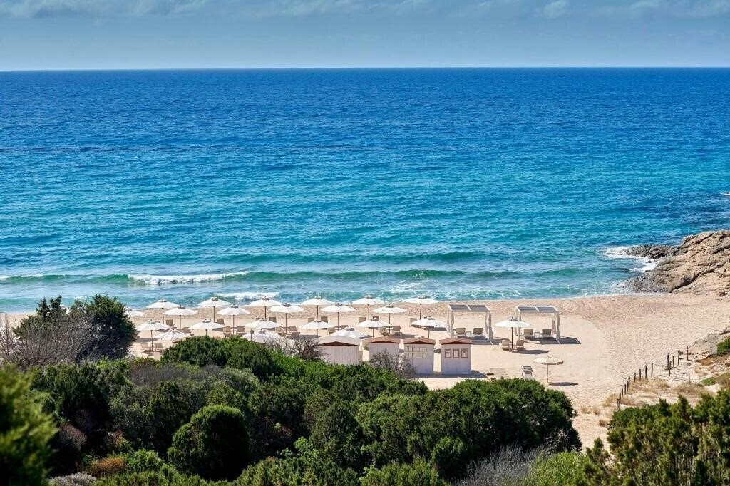 Картинка Baia di Chia Resort Sardinia Curio Collection by Hilton (ex. Chia Laguna Baia di Chia Resort) 5*