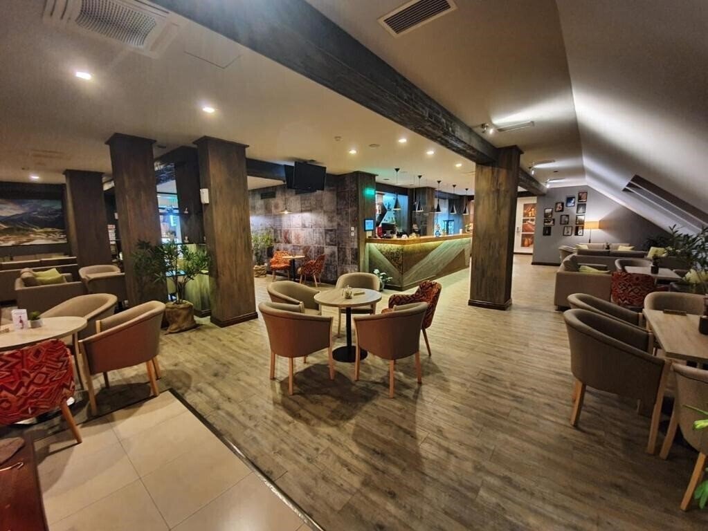 Изображение Escalade 4*